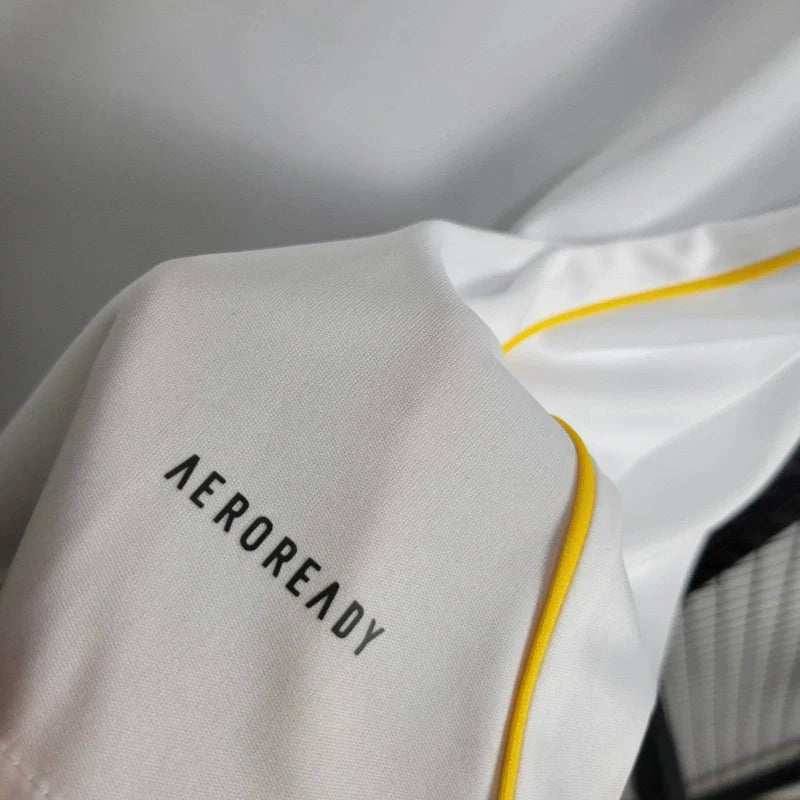 Close-up of a fabric with 'AEROREADY' text on a white background