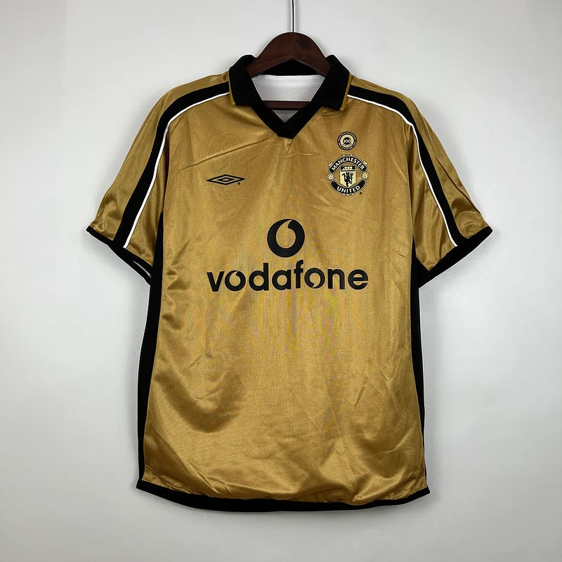 Manchester United 2001-02 Centenary Reversible Jersey – gold side with black accents, Umbro branding and 100th anniversary patch
